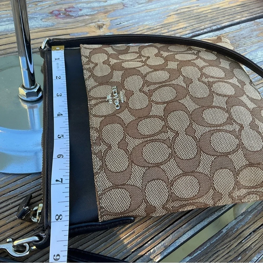 Coach Signature Canvas North South Swingpack Crossbody Bag